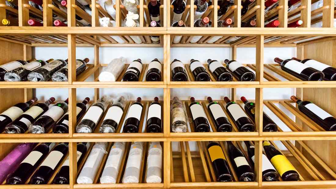 What is the proper way to store wine?
